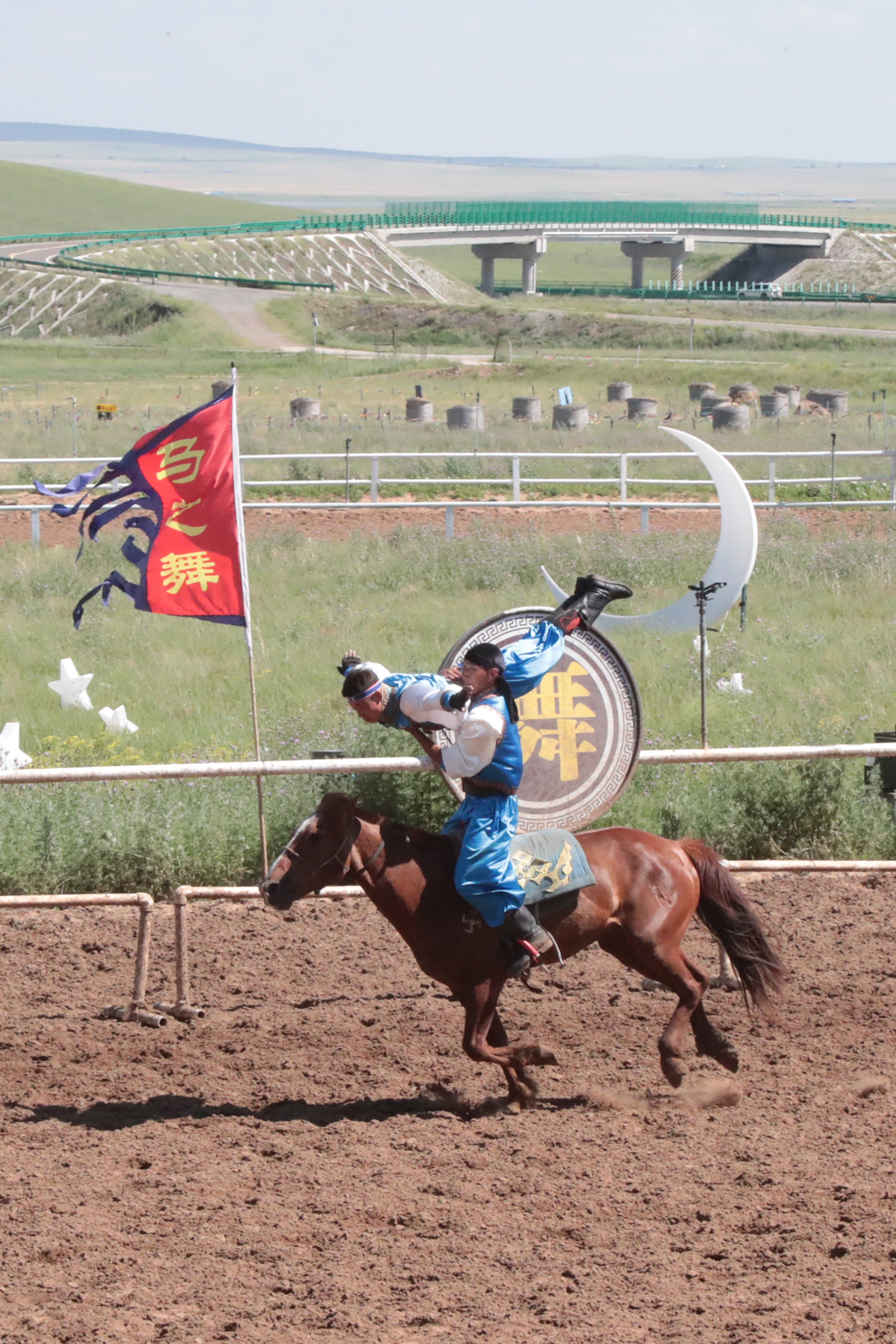 Performers showcase equestrian acrobatics during 