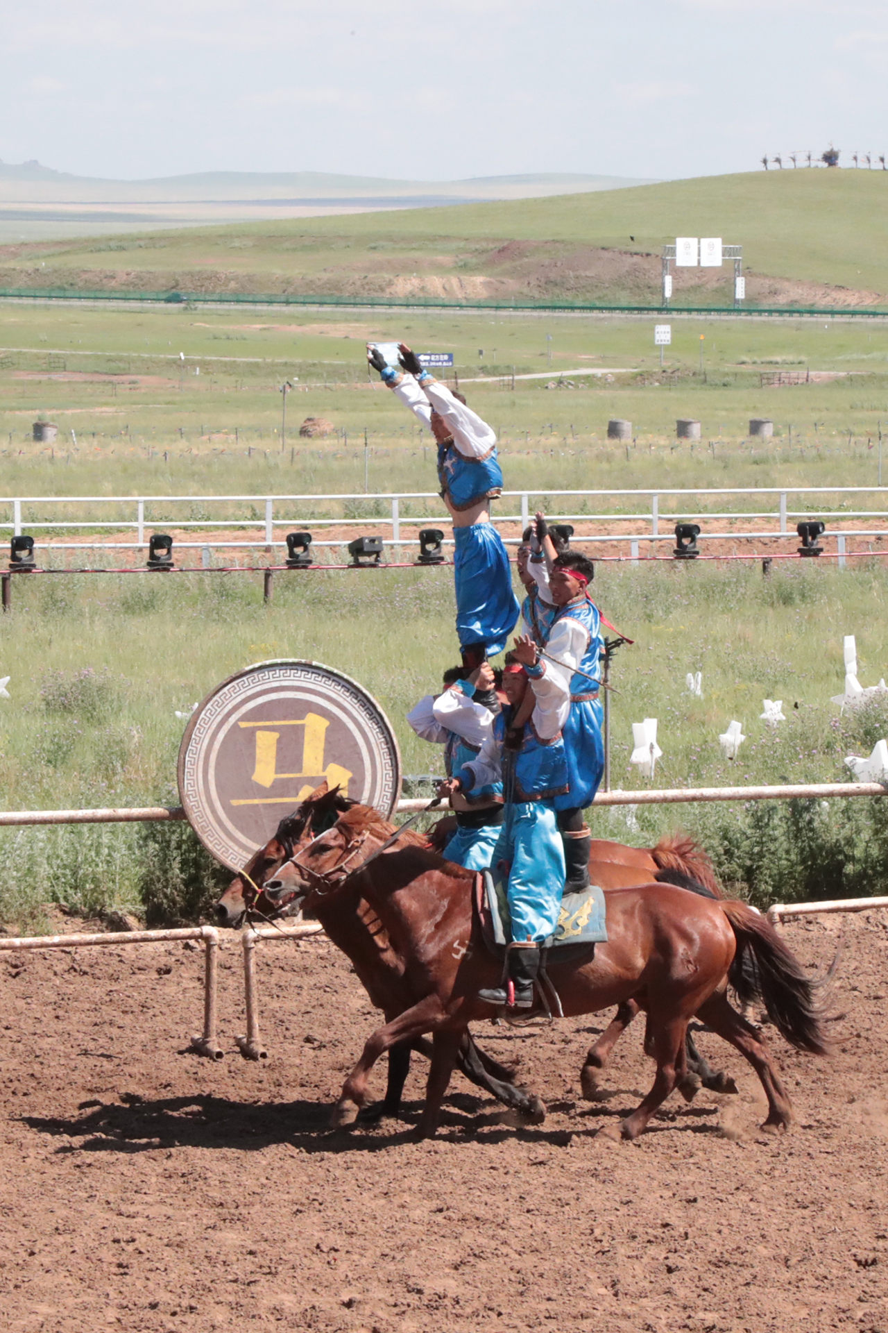 Performers showcase equestrian acrobatics during 