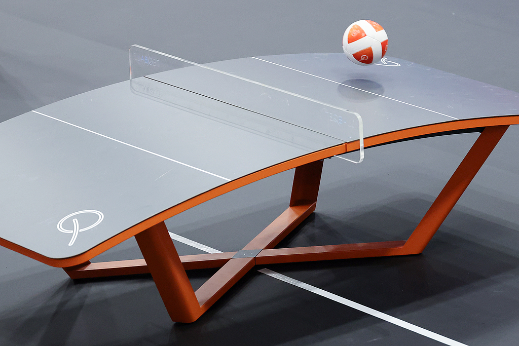 Teqball, a game that mixes football skills with table tennis on a curved table, joins the Asian Games program for the first time this year. /CFP