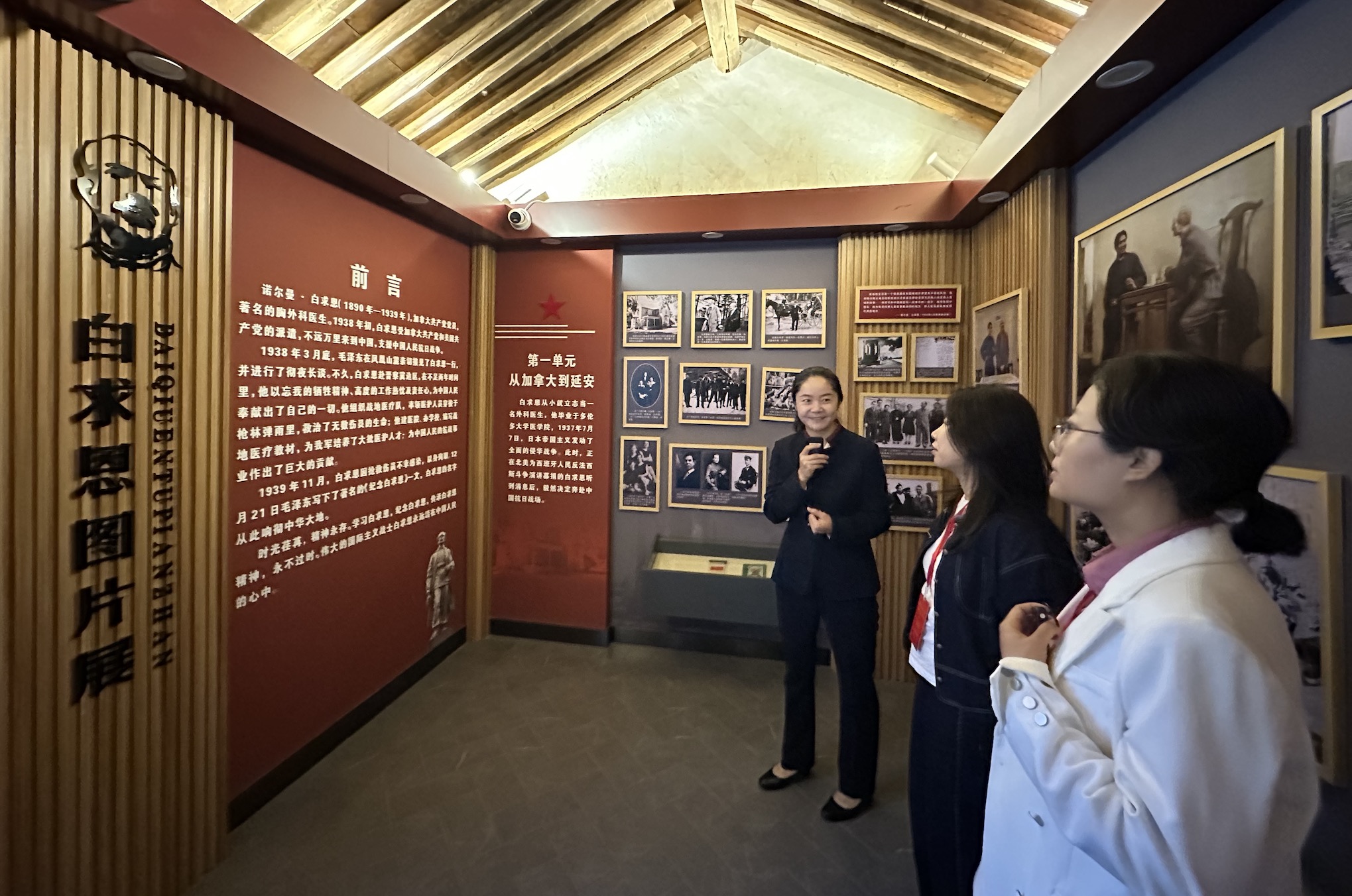 Visitors view the Norman Bethune Photo Exhibition at the Fenghuangshan Revolutionary Site in Yan'an, Shaanxi Province, China, September 17, 2026. Wu Yan/CGTN