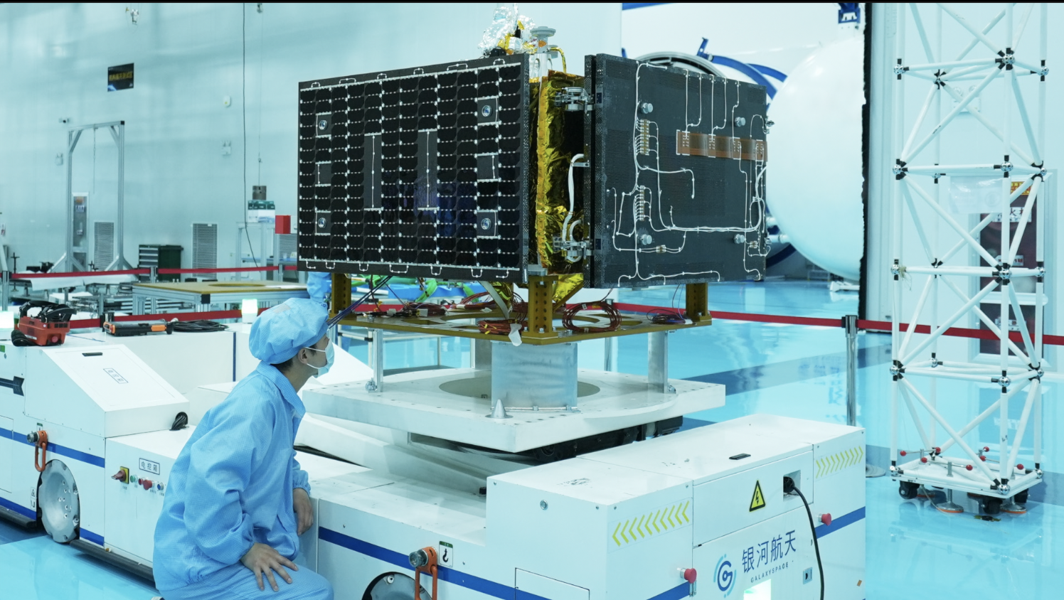 Technicians inspect a satellite in Nantong, Jiangsu Province. March 2026./ GalaxySpace