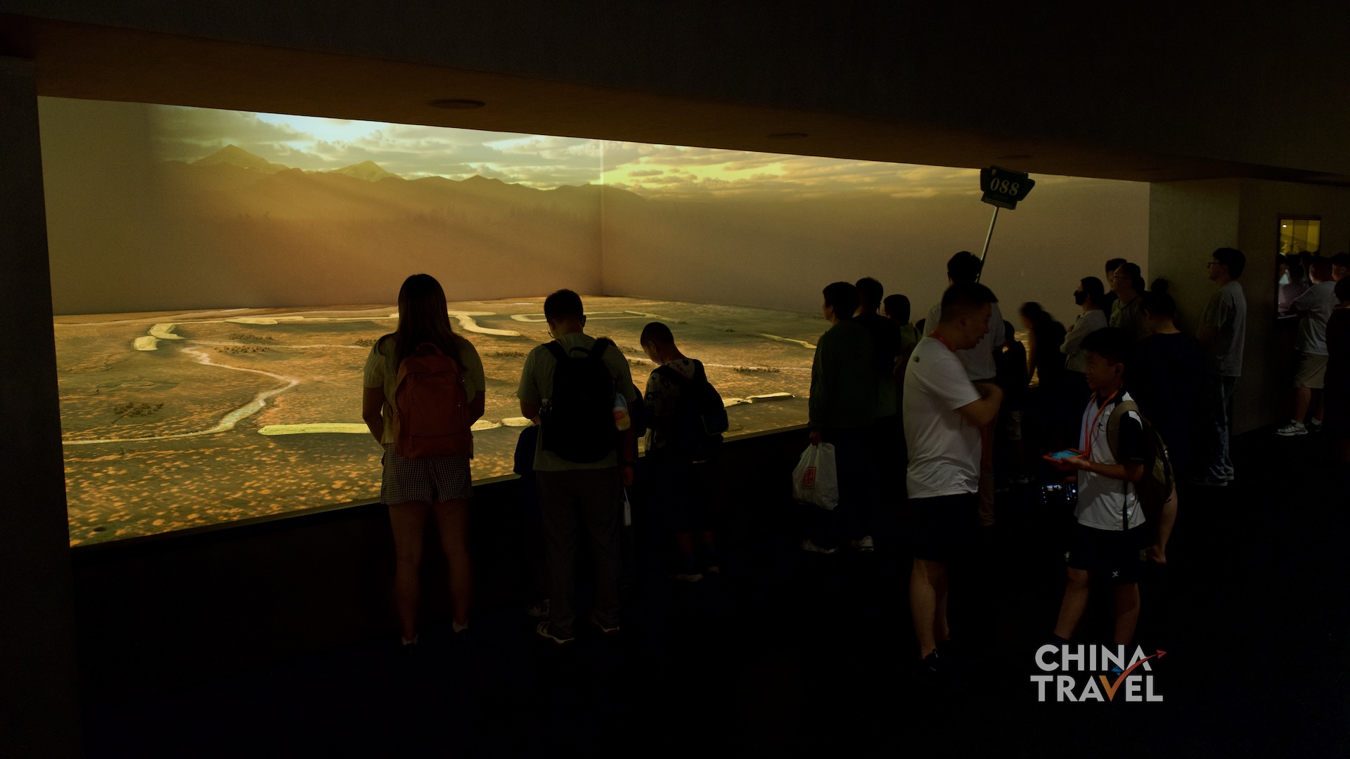 Wall-and-floor projections surround visitors with shifting landscapes, terrain and light, turning archaeological context into a shared spatial experience at the new Sanxingdui Museum in Guanghan, Sichuan Province. /CGTN
