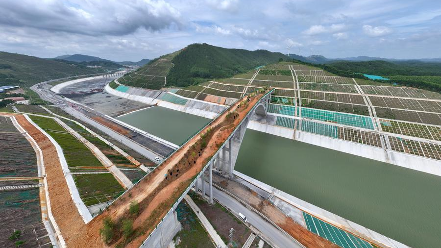 A drone view of a wildlife corridor bridge over the Pinglu Canal in Jiuzhou Town, Lingshan County, Qinzhou City, south China's Guangxi Zhuang Autonomous Region, June 8, 2026. /Xinhua