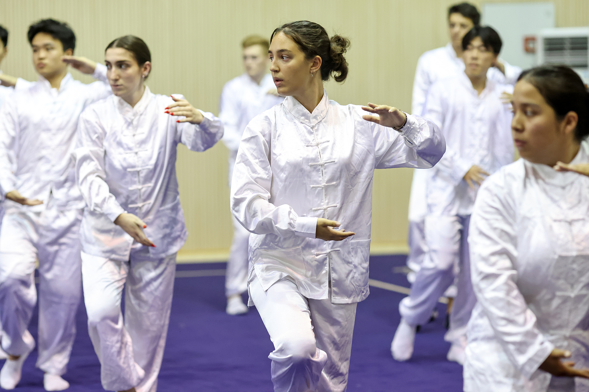 University students from the United States learn Tai Chi and experience Chinese culture at Nanjing Agricultural University, in Nanjing, Jiangsu Province, east China, August 7, 2024. /CFP