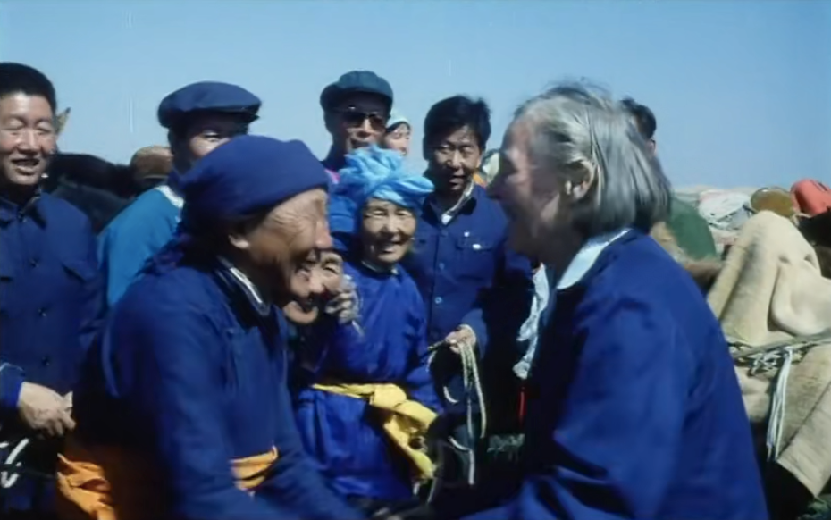 A still from a 1984 documentary by the Central Newsreel and Documentary Film Studio, showing the American couple returning to Sanbian Ranch. /courtesy of the Central Newsreel and Documentary Film Studio