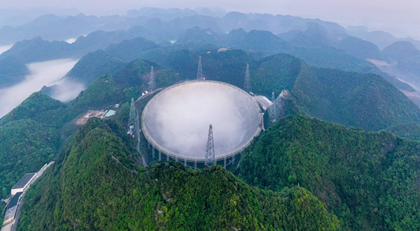 The FAST sits in a natural karst depression in Guizhou Province, southwest China.