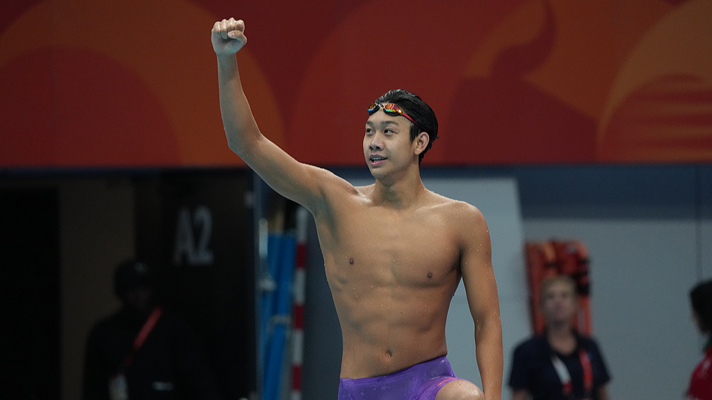 Zhang Zhanshuo of China celebrates winning the gold medal after competing in the Men's 200m Freestyle Final on day four of the 20th Aichi-Nagoya Asian Games at the Tokyo Aquatics Centre in Tokyo, Japan, September 23, 2026. /VCG