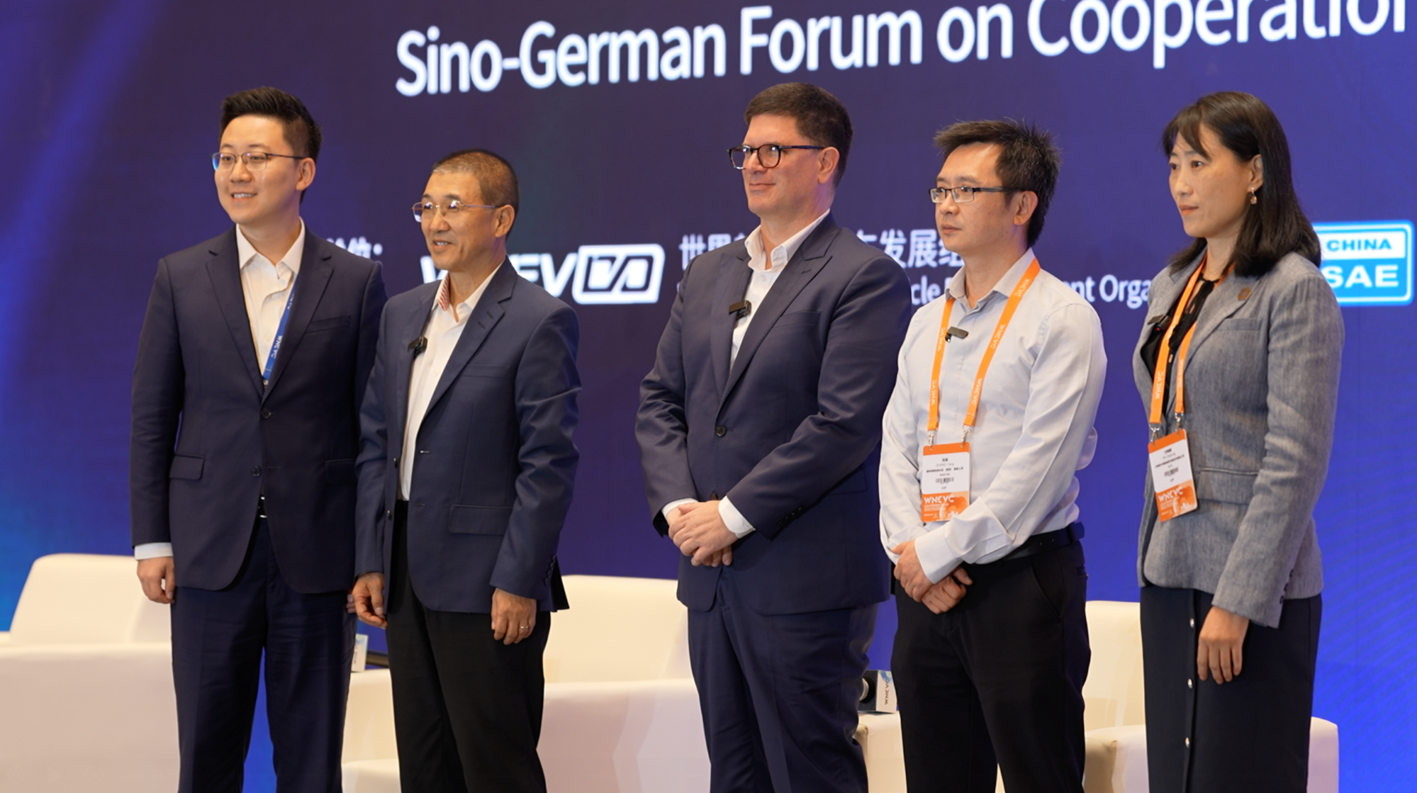 Participants pose for a group photo at the Sino-German Forum on Cooperation and Development of New Energy Vehicles during the 2026 World New Energy Vehicle Congress in Haikou, Hainan Province, China, September 22, 2026. /WNEVC