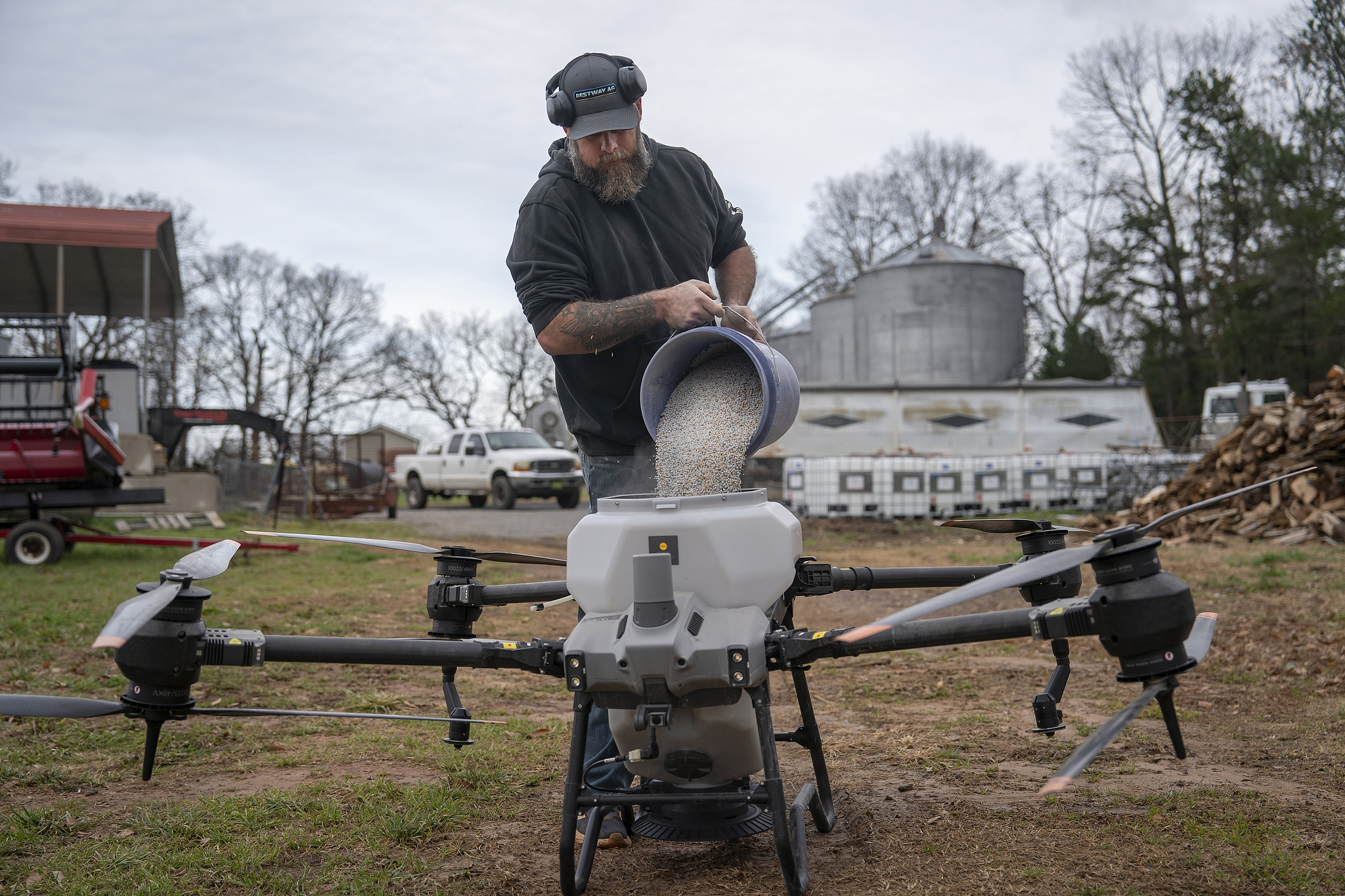A farmer prepares a Chinese-made DJI drone to put a crop cover on his farm in Hickory, North Carolina, the United States, December 17, 2024. /CFP
