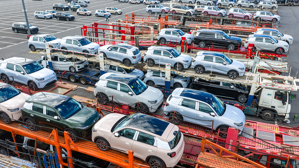 New electric vehicles are being dispatched to various places at the parking lot of an automobile factory in Jinhua, Zhejiang Province, China, August 31, 2026. /VCG