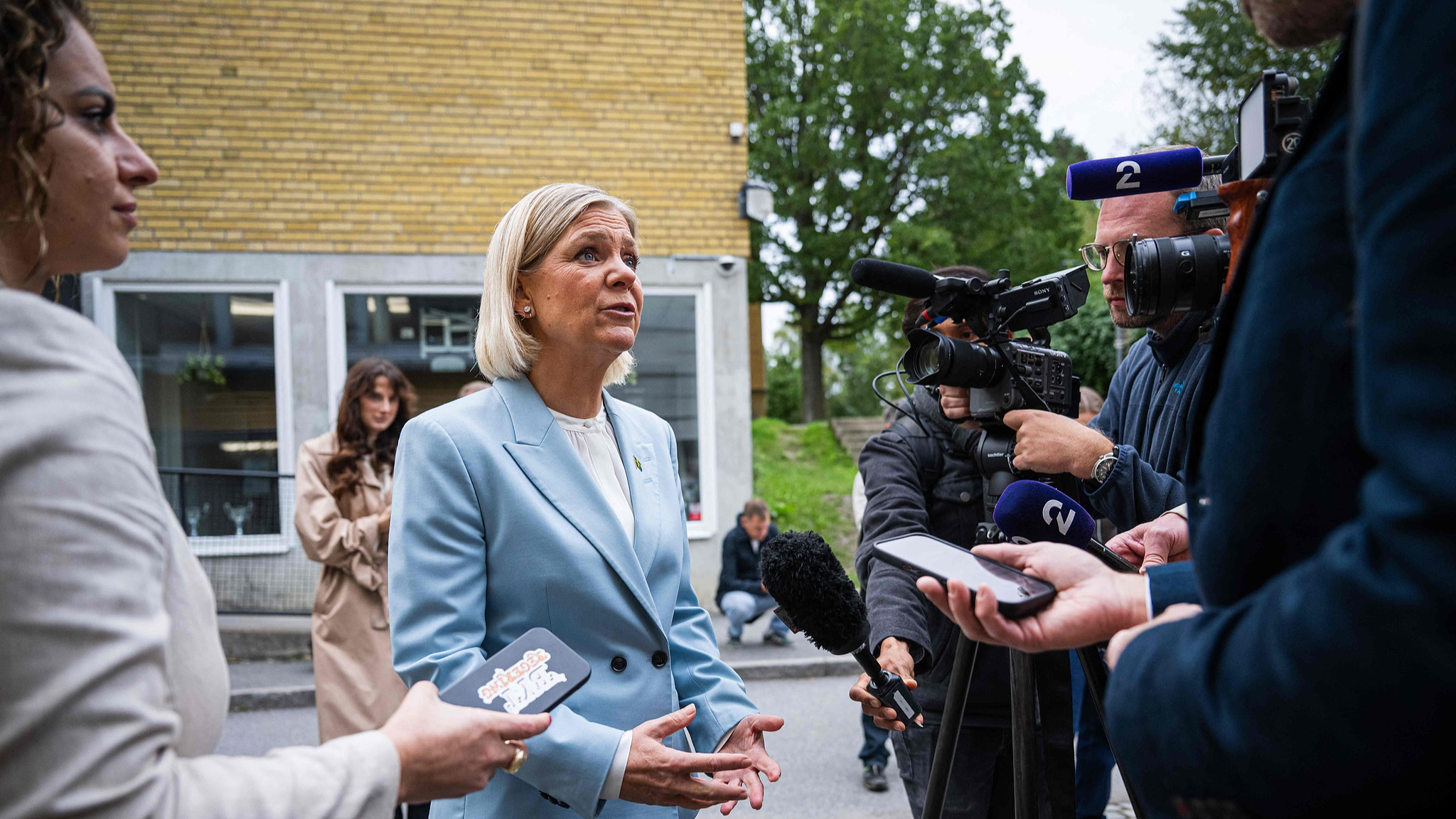 Social Democratic Party leader Magdalena Andersson makes a press statement after casting her vote at a polling station in a school during Sweden's general election, in Nacka, September 13, 2026. /VCG