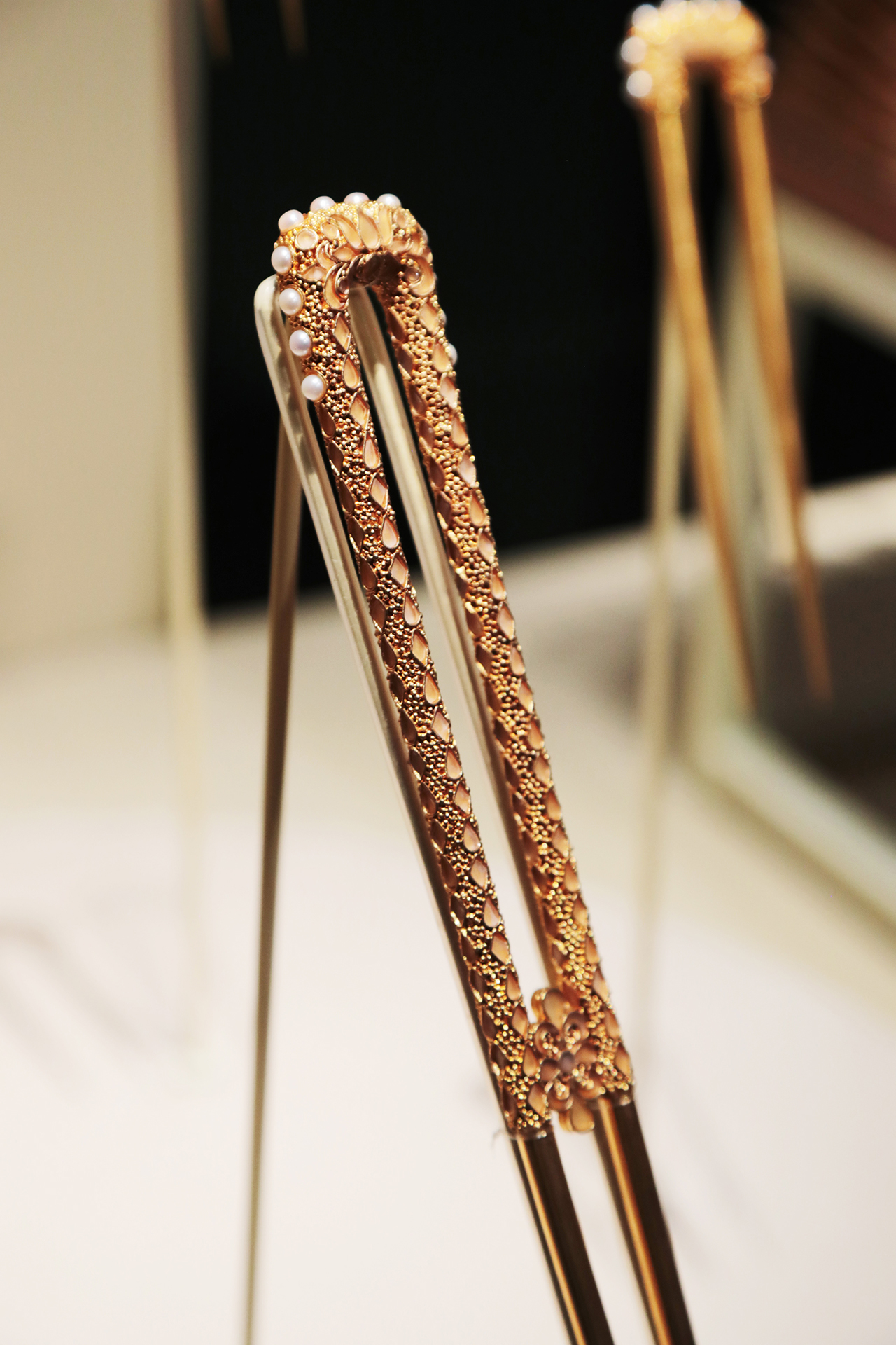 Hairpins from Empress Xiao's crown are seen on display at the National Museum of China in Beijing. /CGTN