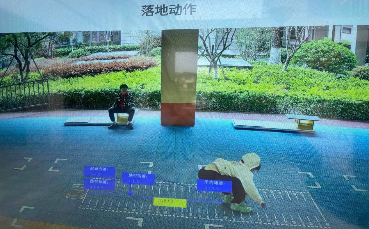 An AI-powered system captures and analyzes students' instantaneous movements during the long-jump, Hangzhou Yucai Experimental School.