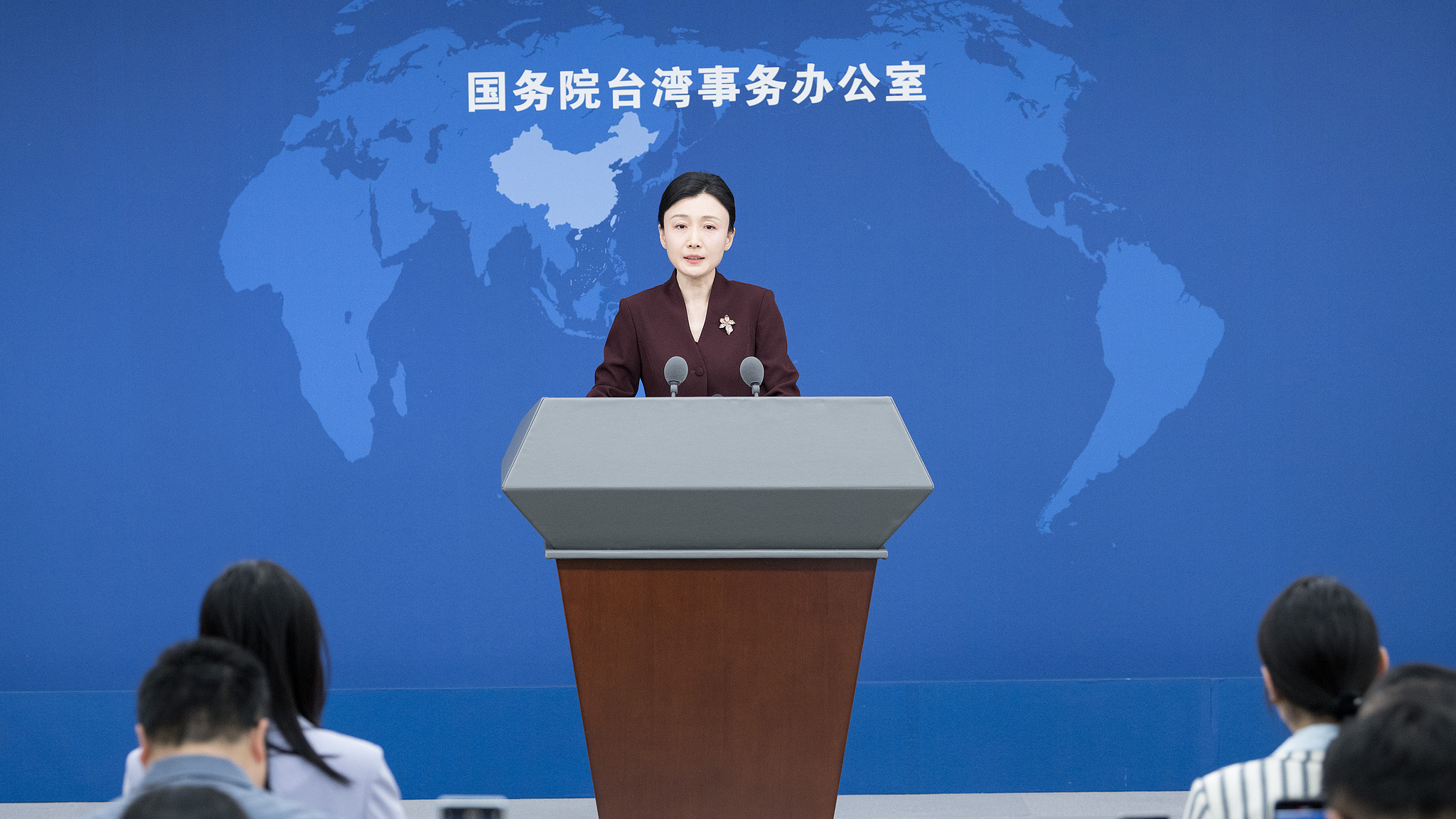 Zhang Han, spokesperson for the State Council Taiwan Affairs Office, holds a press conference in Beijing, September 30, 2026. /VCG