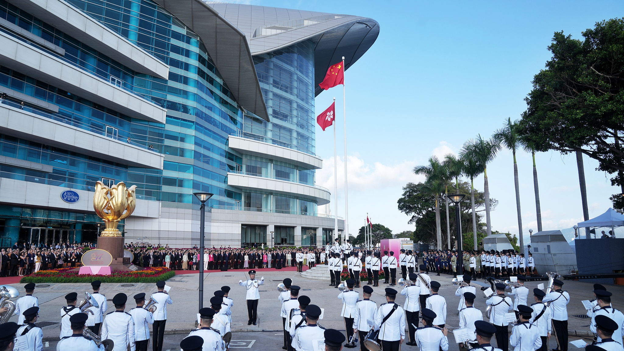 A flag-raising ceremony to celebrate the 77th anniversary of the founding of the People's Republic of China is held at the Golden Bauhinia Square in Hong Kong, south China, October 1, 2026. /VCG