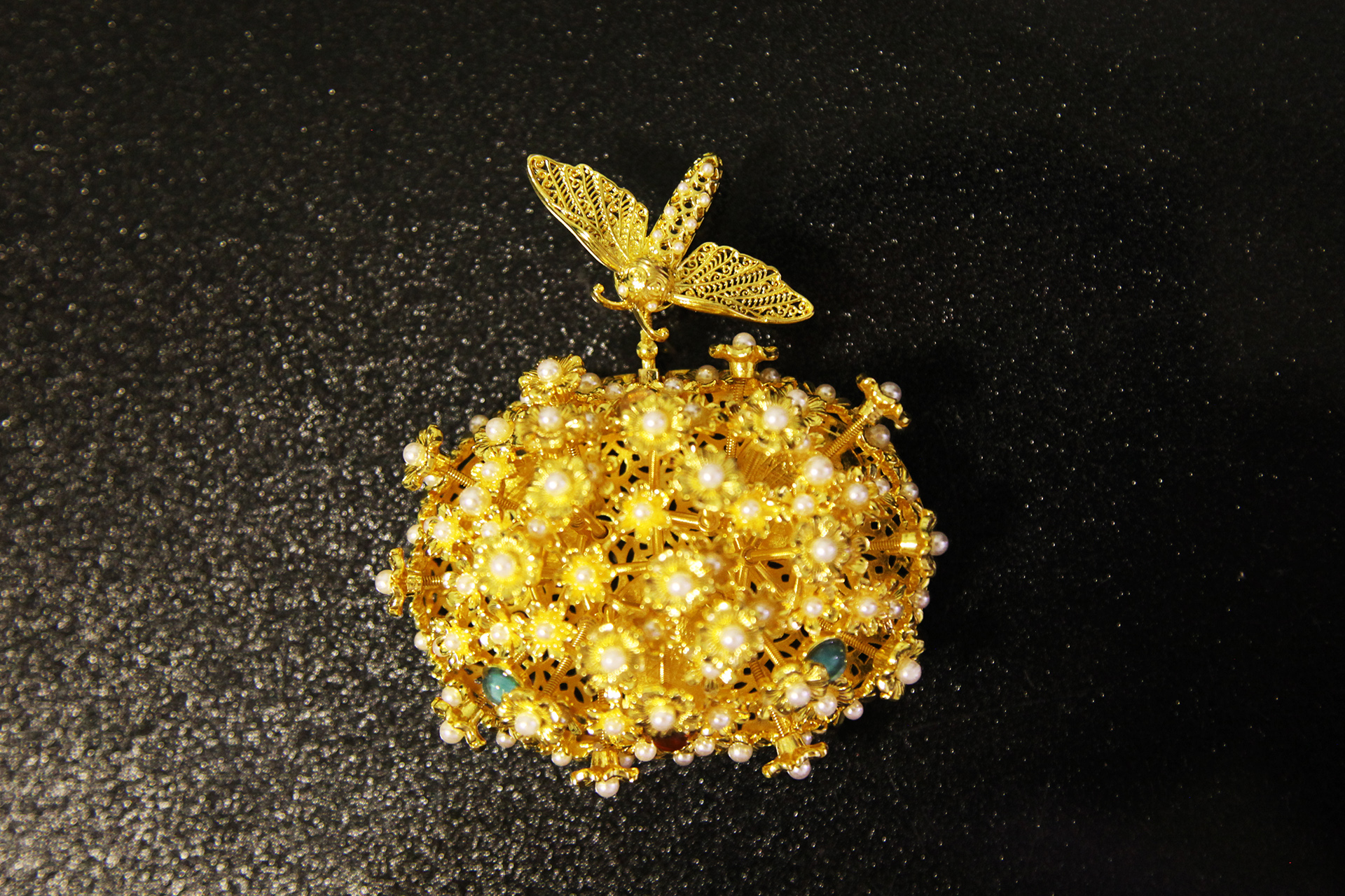 A cultural and creative product inspired by the moth hairpin. /CGTN