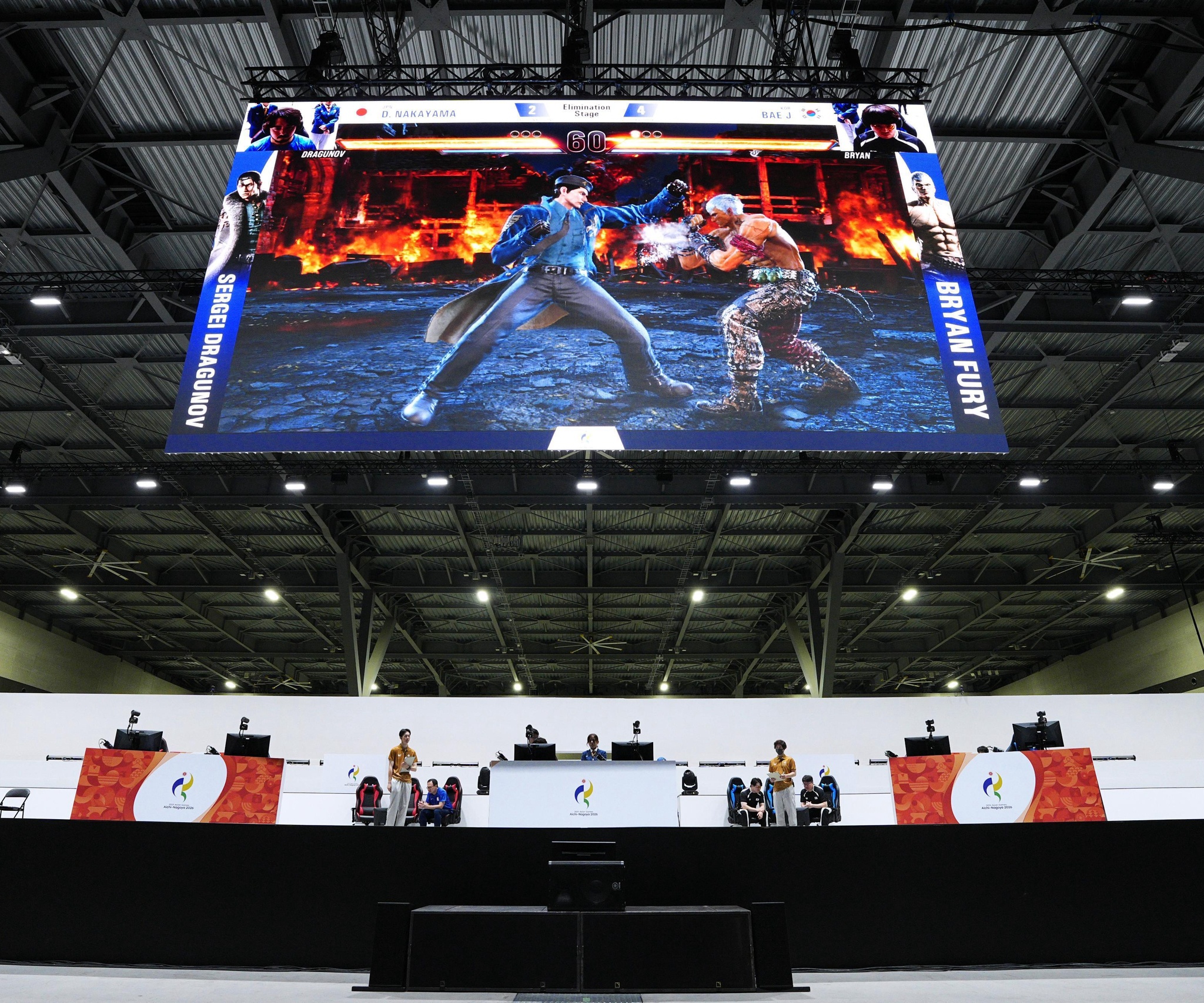 Players from Japan and South Korea compete in the esports fighting game final at the Aichi Sky Expo during the Aichi-Nagoya Asian Games in Aichi Prefecture, Japan, September 26, 2026. /ICphoto