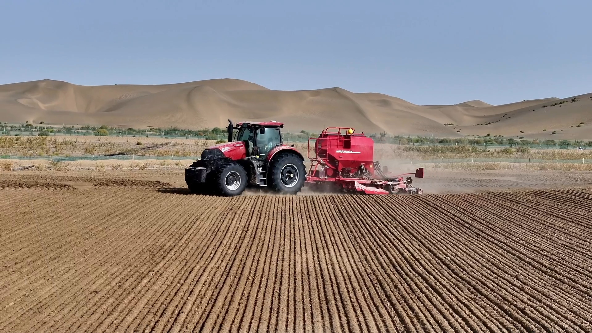 A Beidou-powered seed drill runs in a farm near Kunyu City, northwest China's Xinjiang Uygur Autonomous Region, October 5, 2026. /CMG