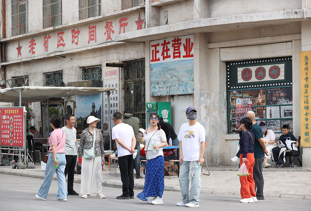Visitors touring the Shitanjing Industrial Cultural Tourism and Film Town in the Ningxia Hui Autonomous Region, China, October 2, 2026. /VCG