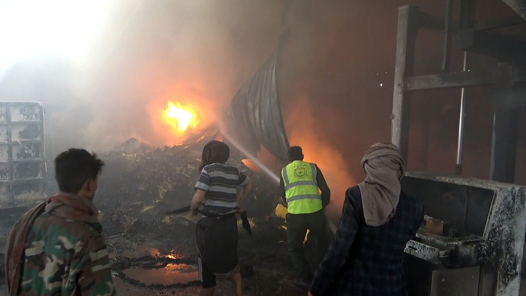Firefighters extinguish the fire after an alleged Saudi airstrike targeted a factory in Sana'a, Yemen, October 4, 2026. /VCG