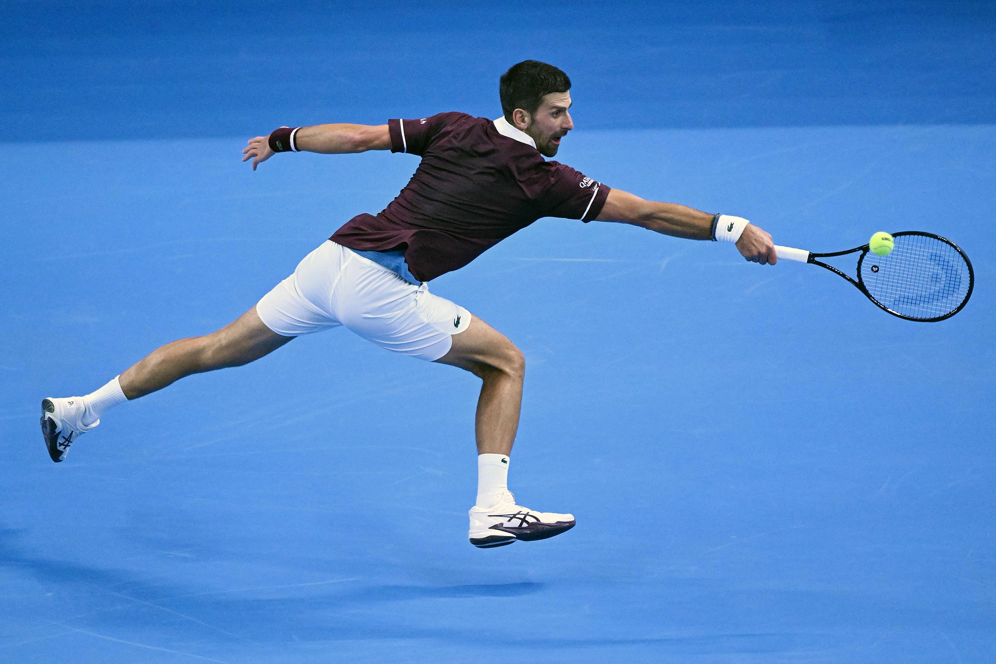 Serbia’s Novak Djokovic hits a return to Russia’s Daniil Medvedev during their men’s singles semi-final match at the China Open tennis tournament in Beijing, China, October 5, 2026. /VCG