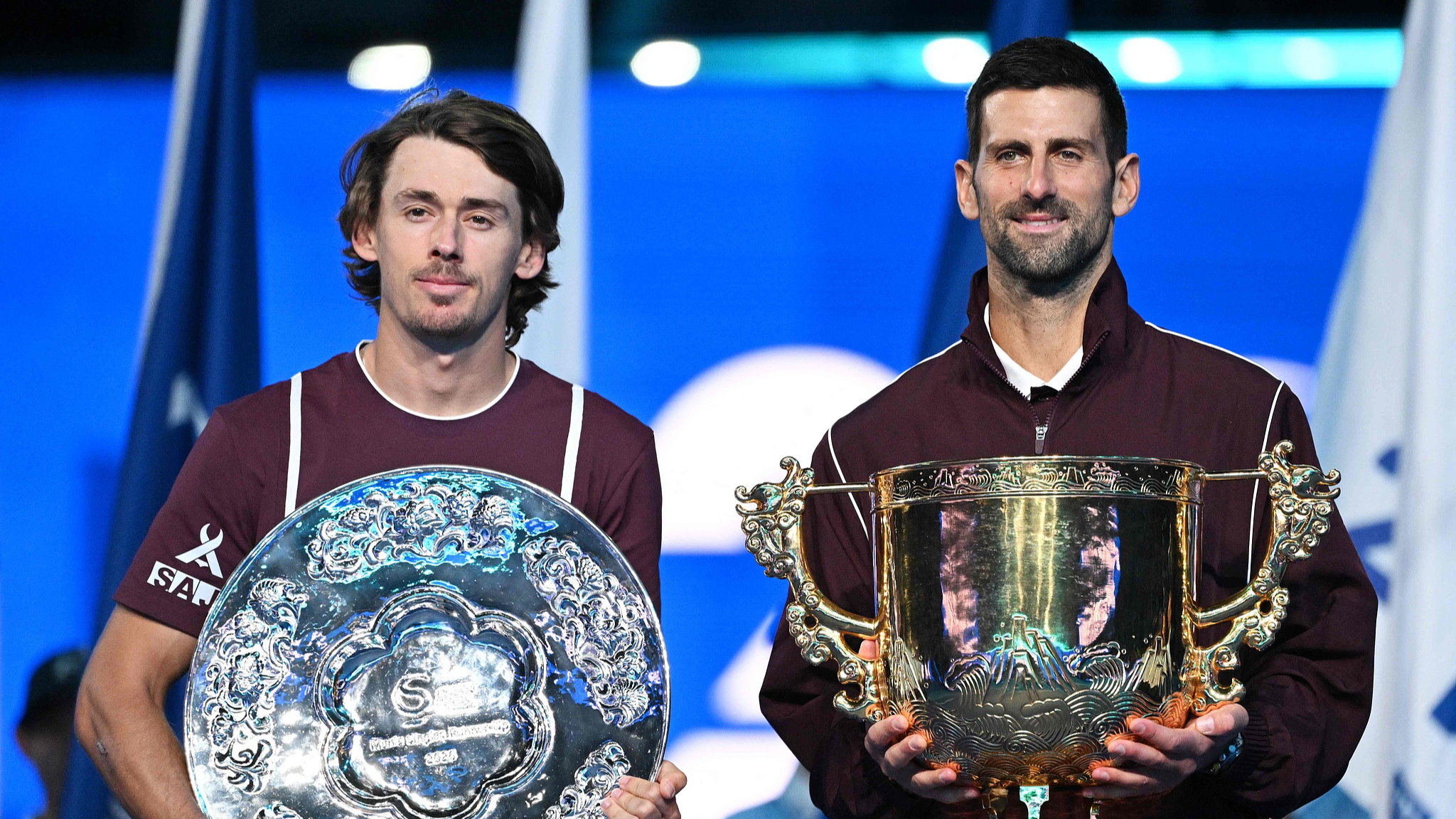 Djokovic wins seventh China Open title after de Minaur retires injured