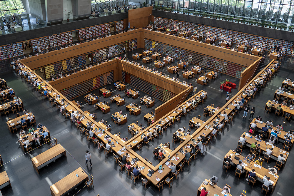 Readers use a sunken reading area at Beijing Library in Beijing, China, October 2024. /CGTN