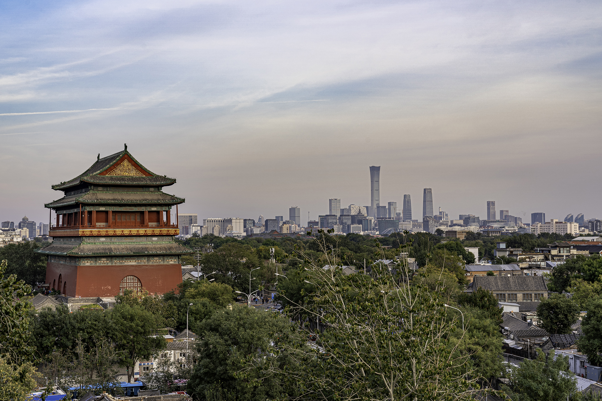Beijing's Drum Tower stands against the city's modern skyline in Beijing, China, February 2022. /CGTN
