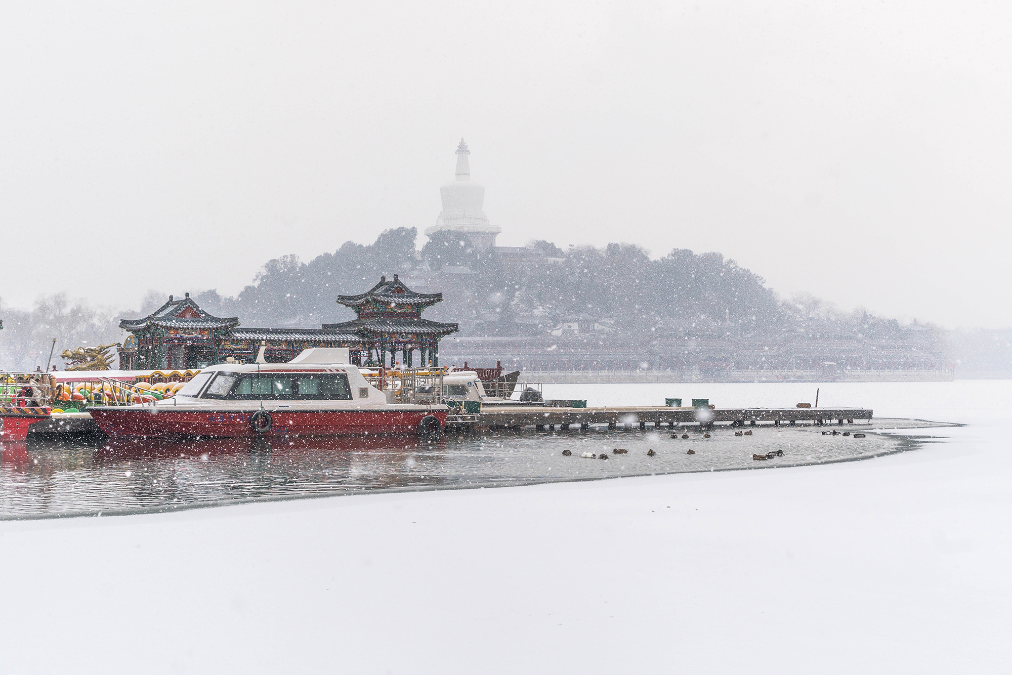 The White Pagoda Temple is seen after snowfall in Beijing, China, January 2022. /CGTN
