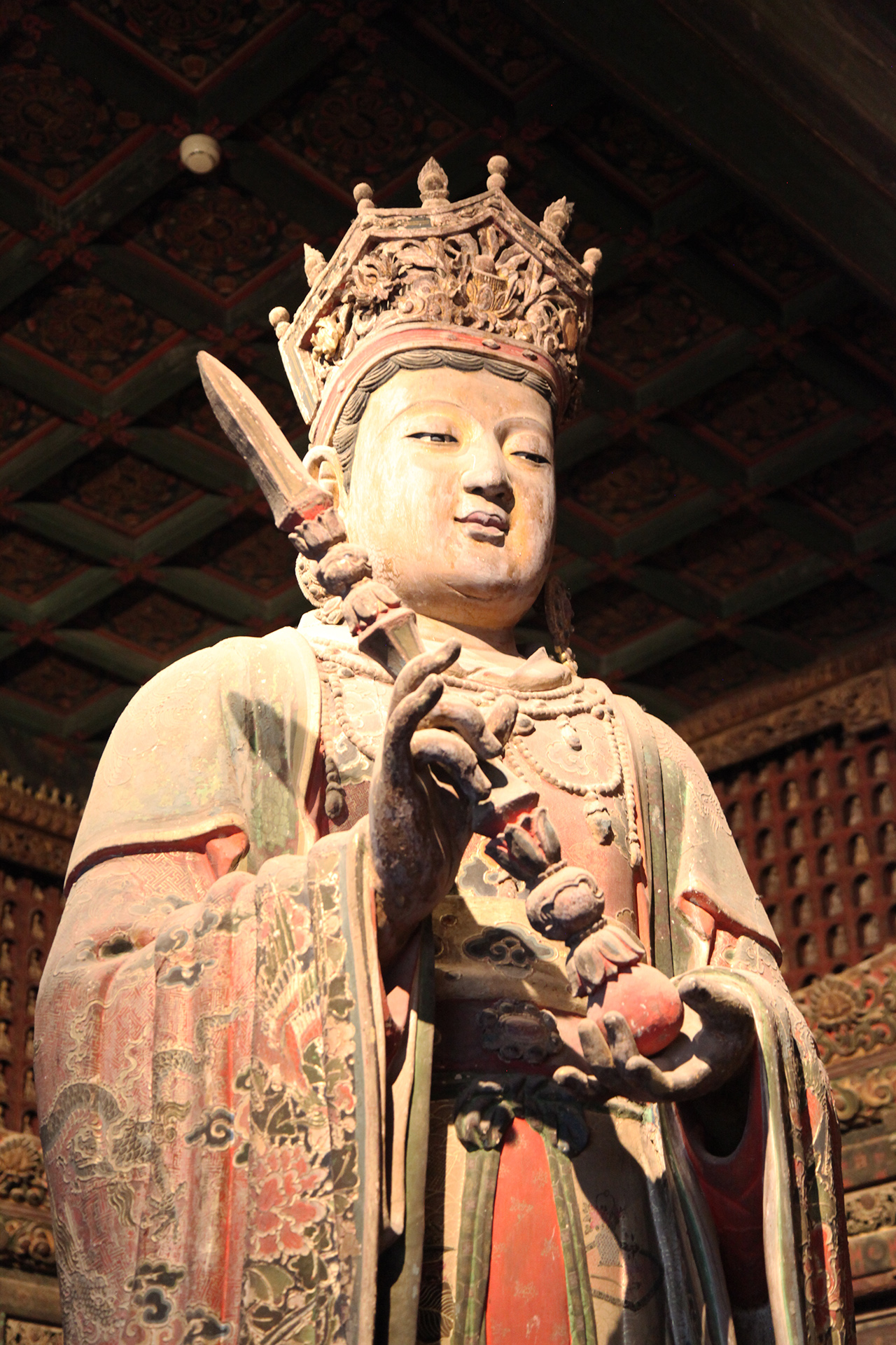 A statue of Indra, king of the Hindu gods, is seen at the Zhihua Temple in Beijing. /CGTN