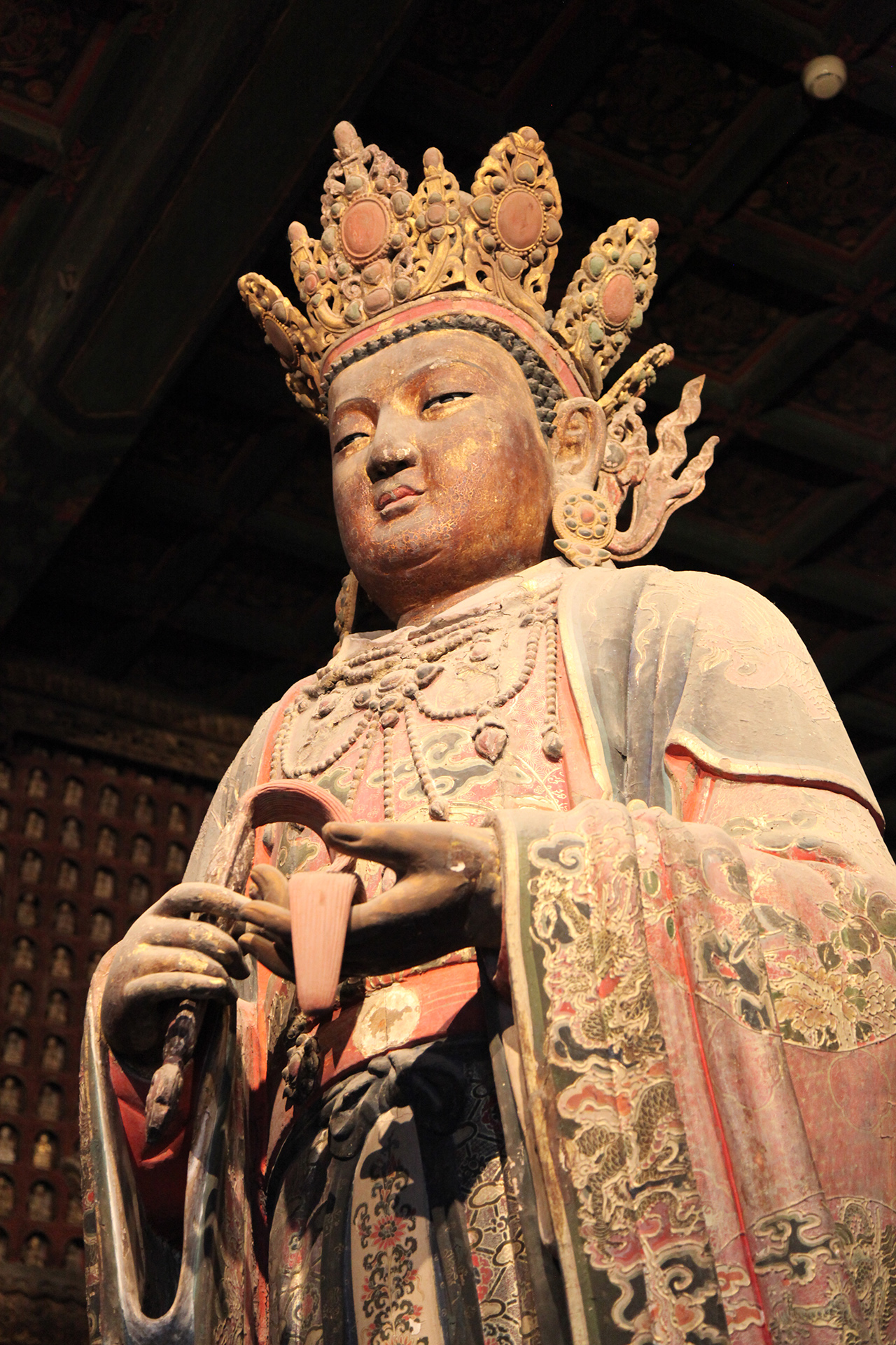 A statue of the Hindu god Brahma is seen at the Zhihua Temple in Beijing. /CGTN