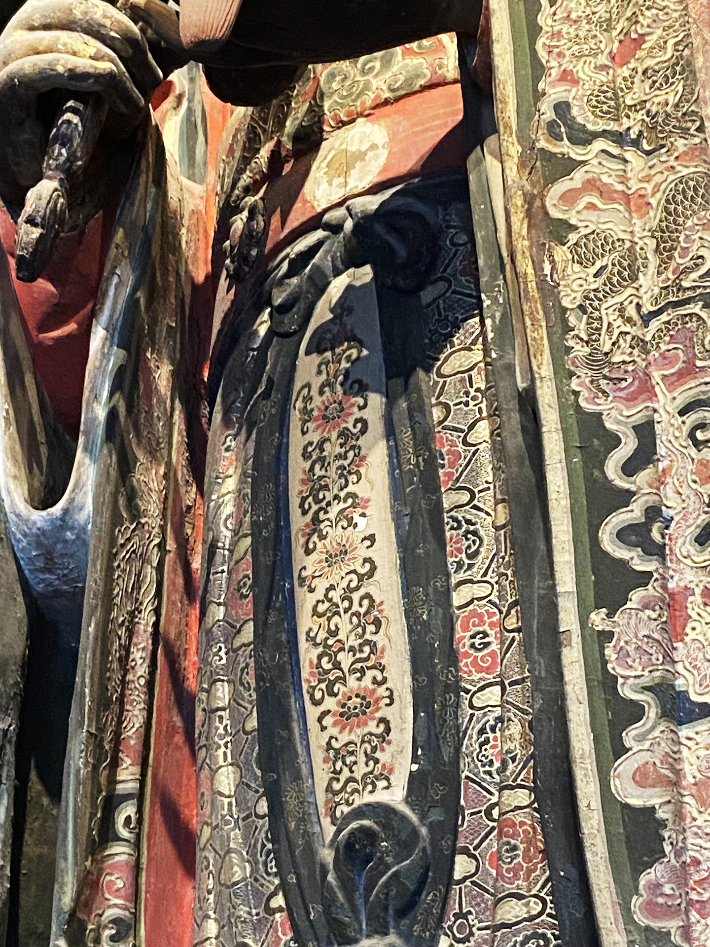 The robe of the Brahma statue at the Zhihua Temple in Beijing features exquisite patterns. /CGTN