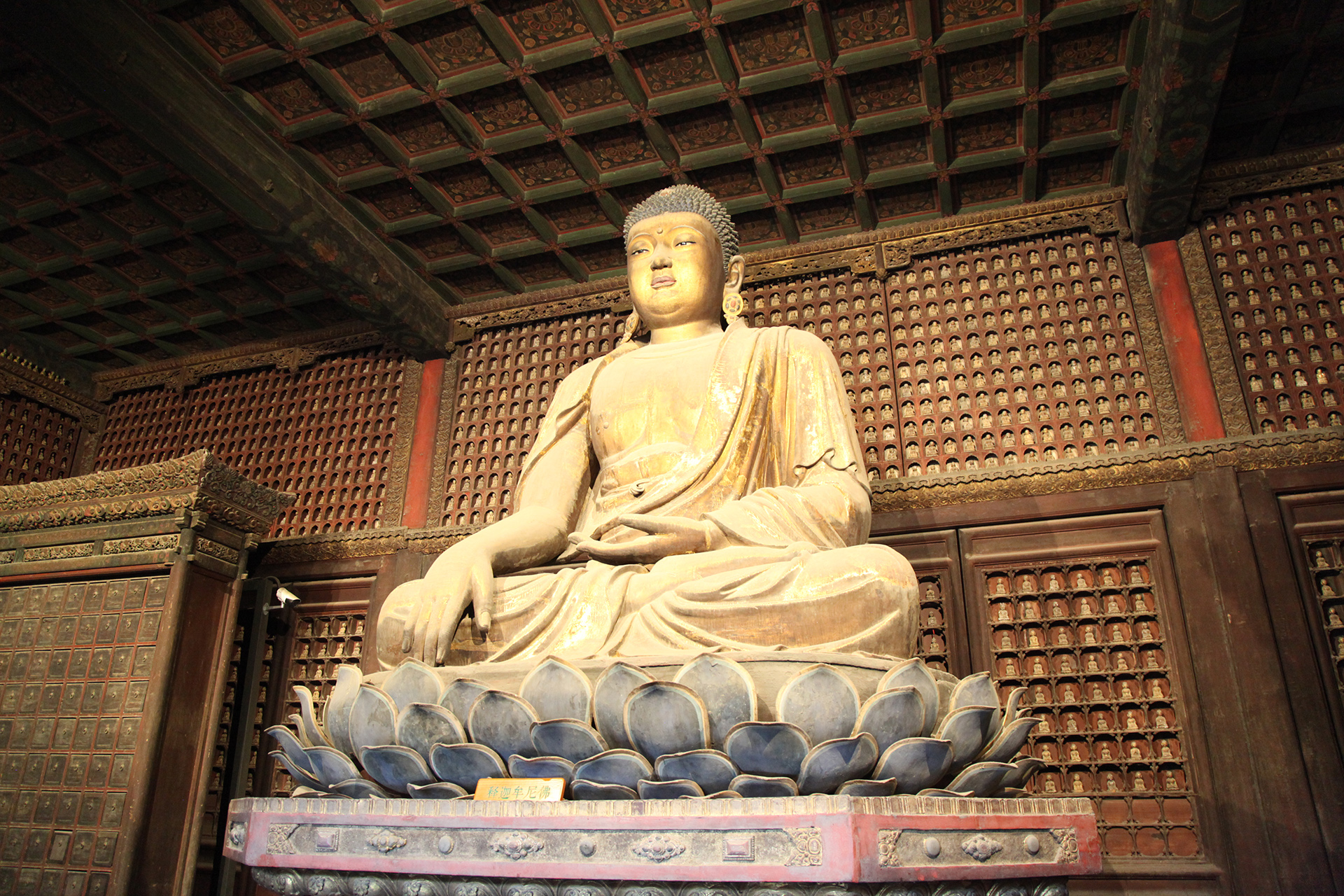 A statue of Shakyamuni Buddha is seen at the Zhihua Temple in Beijing. /CGTN