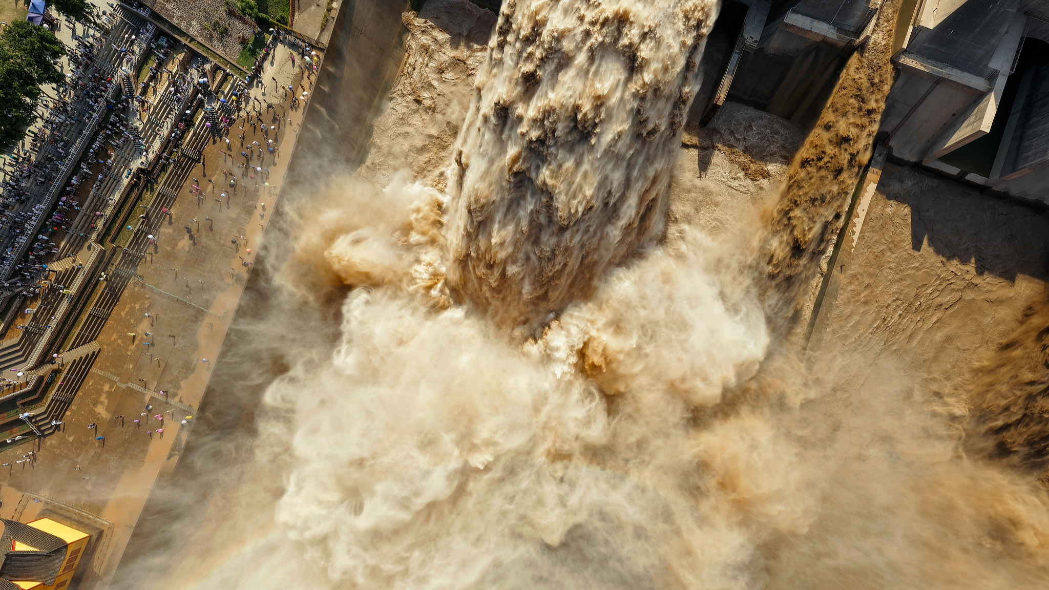 Water is discharged to flush sediment at the Xiaolangdi Water Conservancy Project in central China's Henan Province, July 5, 2026. /VCG