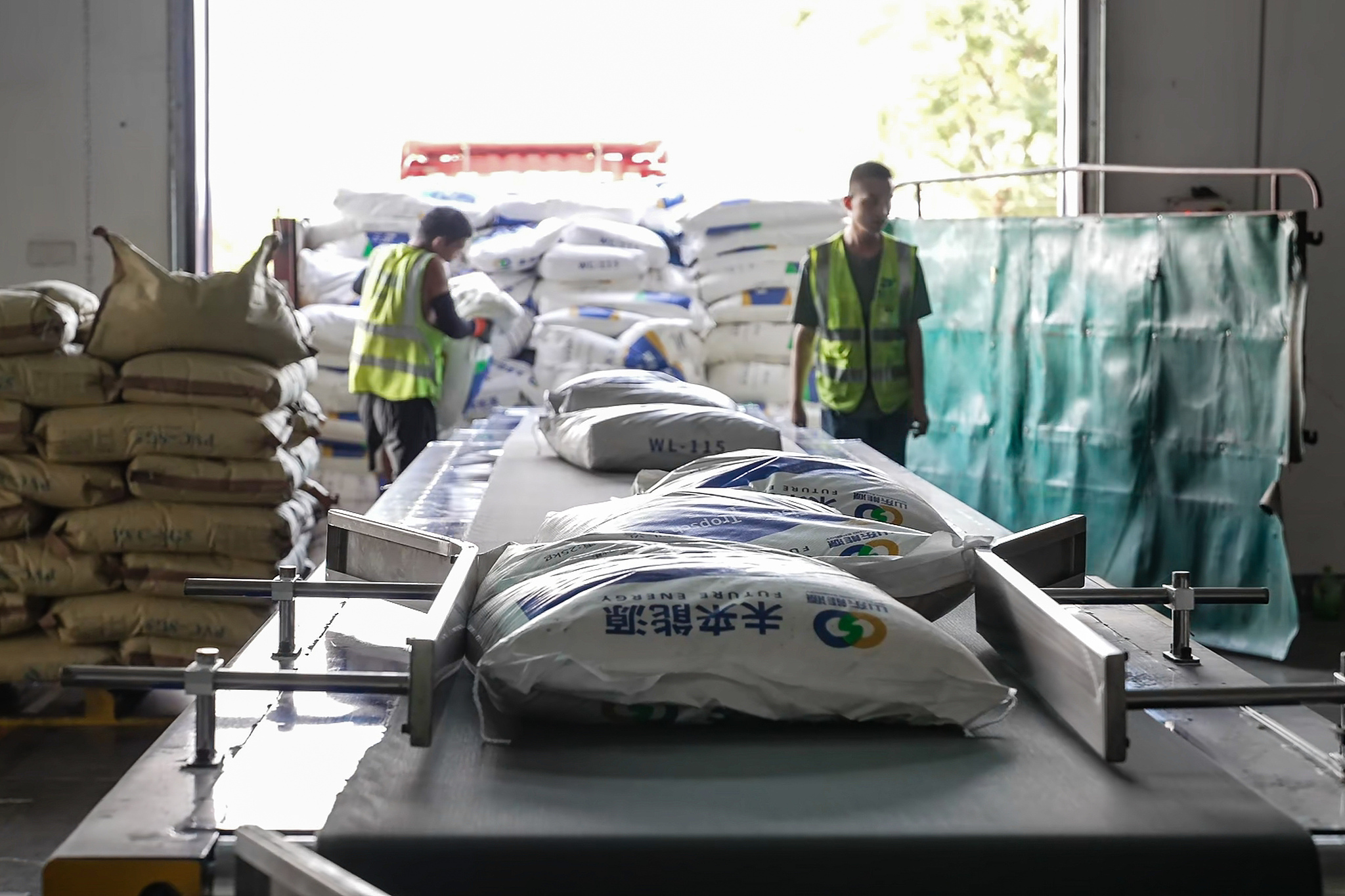 Staff are seen loading and transporting goods at Xi'an International Port Station, for transport via train to Duisburg, Germany. September 3, 2026 /VCG