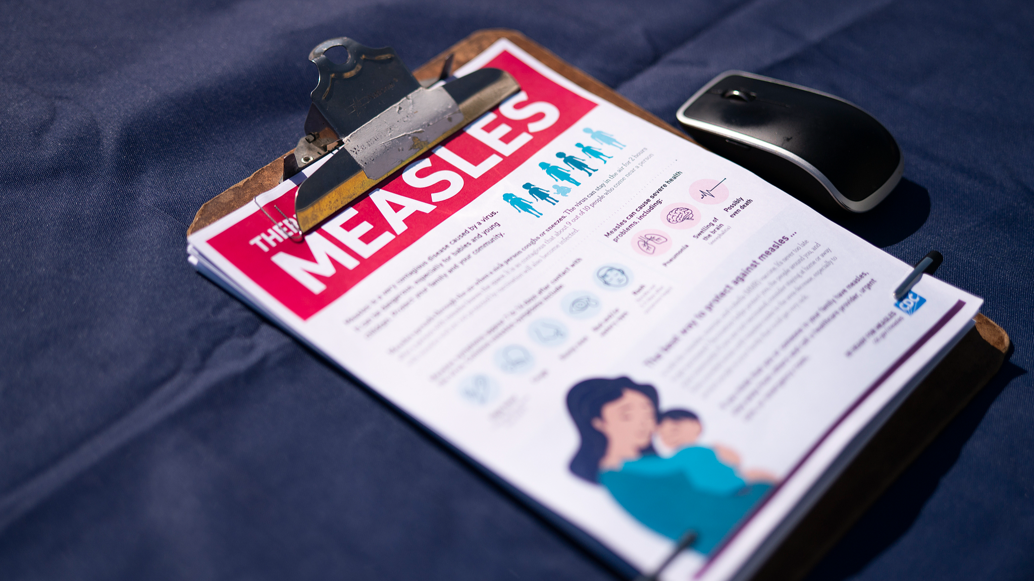 A fact sheet for measles sits on a table at a mobile clinic offering free vaccinations in Spartanburg, South Carolina, the United States, February 6, 2026. /CFP