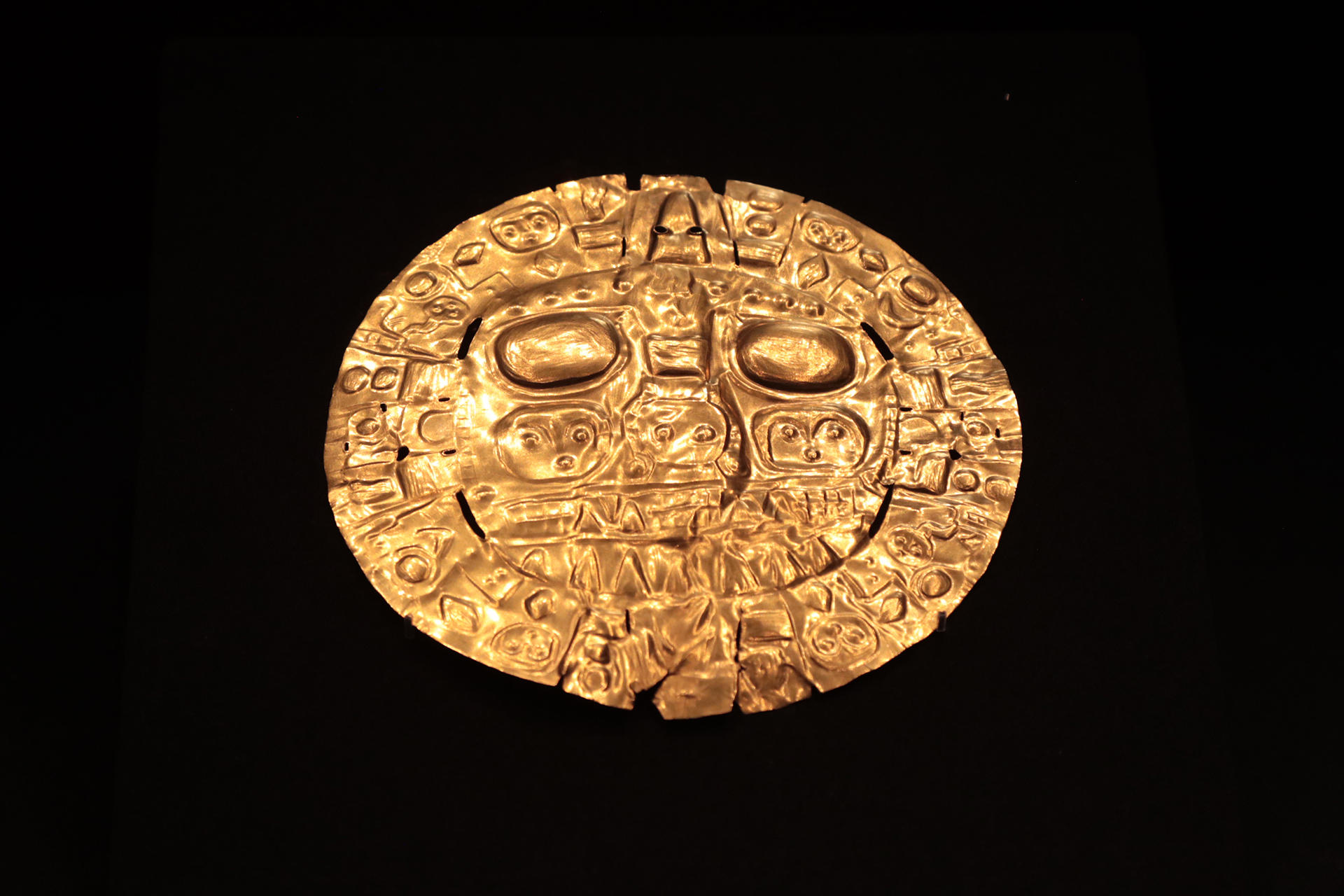 A sun-motif disk is seen on display at the 