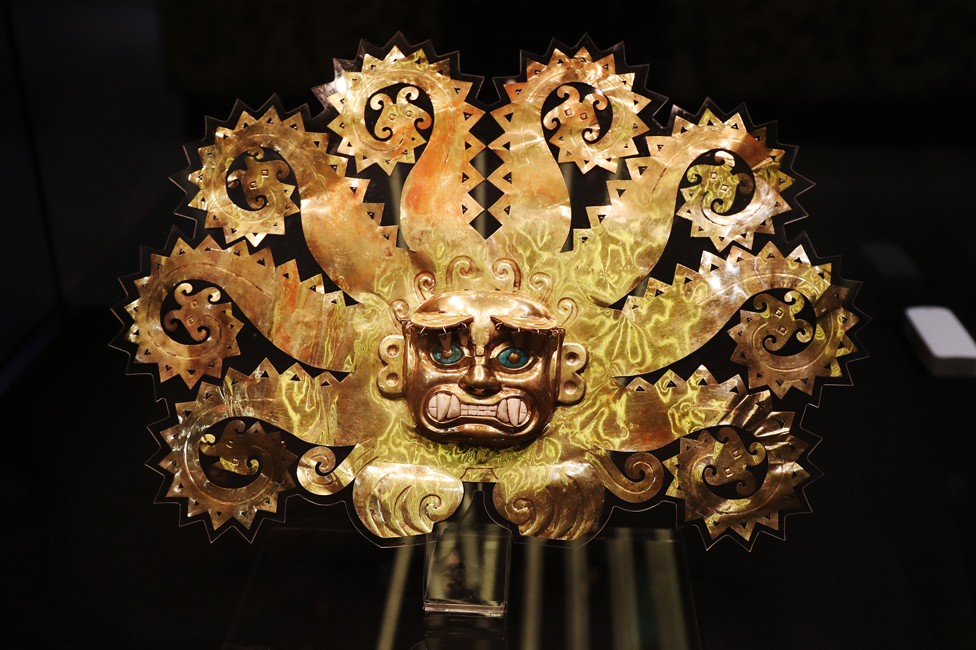 A gold headdress is seen on display at the 