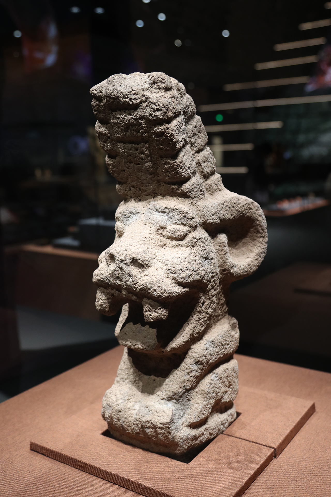 A zoomorphic jaguar sculpture with a maize cob headdress is seen on display at the 
