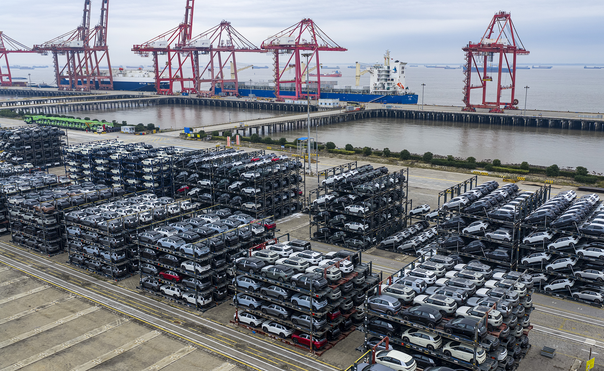 A batch of export vehicles waits to be loaded and shipped at the Suzhou Port in Taicang, Jiangsu Province, China, October 12, 2026. /VCG