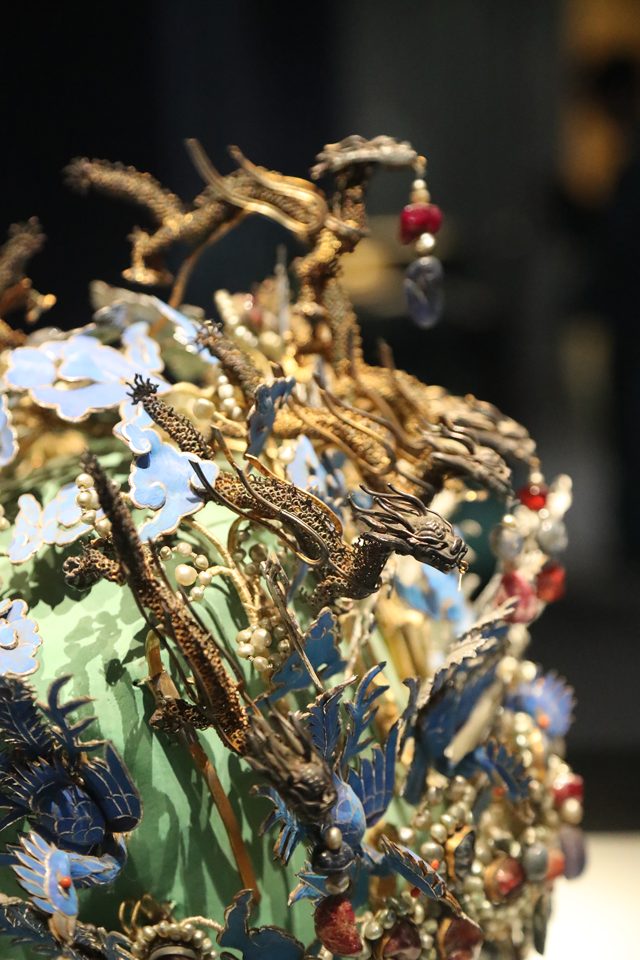 This photo taken on October 10, 2026 shows details of the Twelve-Dragon and Nine-Phoenix Crown of Empress Xiaojing from the Ming Dynasty on display at the Capital Museum in Beijing. /CGTN