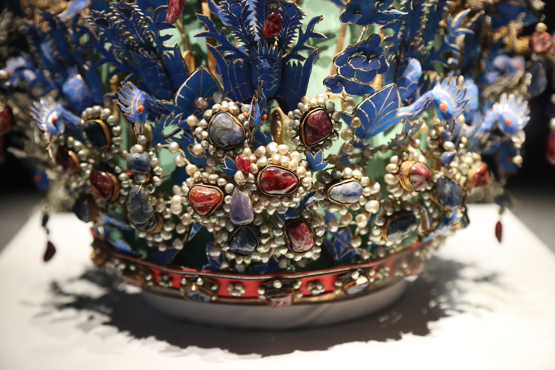 This photo taken on October 10, 2026 shows details of the Twelve-Dragon and Nine-Phoenix Crown of Empress Xiaojing from the Ming Dynasty on display at the Capital Museum in Beijing. /CGTN