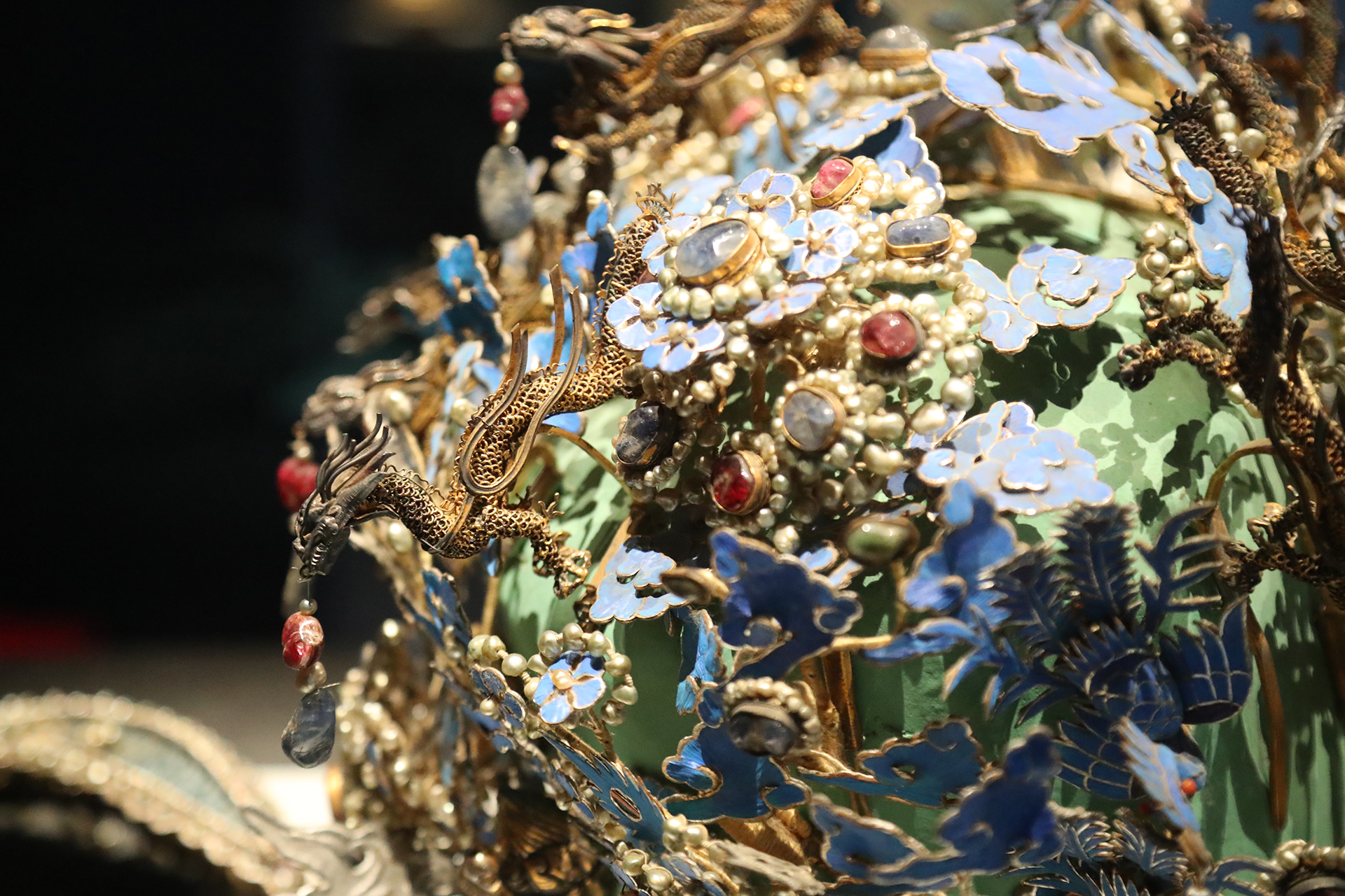 This photo taken on October 10, 2026 shows details of the Twelve-Dragon and Nine-Phoenix Crown of Empress Xiaojing from the Ming Dynasty on display at the Capital Museum in Beijing. /CGTN