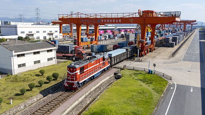 A China-Europe freight train (Yiwu-Xinjiang-Europe) fully loaded with electronic products, daily necessities, textile raw materials and other goods departing from Jinhua South Railway Station, Zhejiang Province, October 8, 2026. /VCG