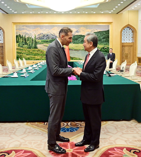 Wang Yi, a member of the Political Bureau of the CPC Central Committee and director of the Office of the Foreign Affairs Commission of the CPC Central Committee, meets with Khaldoon Khalifa Al Mubarak, special envoy of the president of the UAE to China, in Beijing, China, October 13, 2026. /Chinese Foreign Ministry