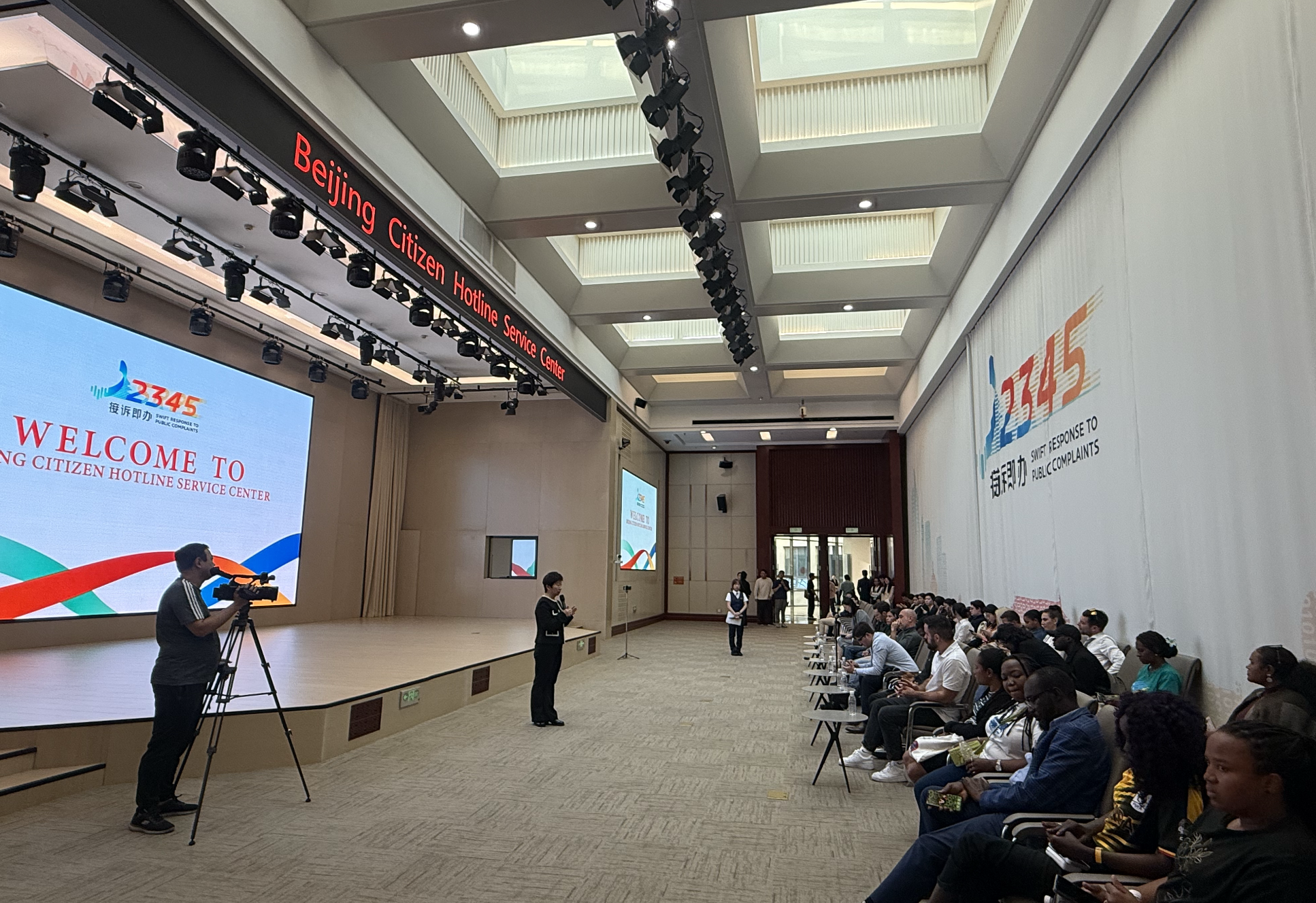 Media representatives from the Global South visit the Beijing Citizen Hotline Service Center to learn firsthand how the system operates and how digital and intelligent technologies are being applied to public services, October 9, Beijing. Zaruhi Poghosyan/CGTN