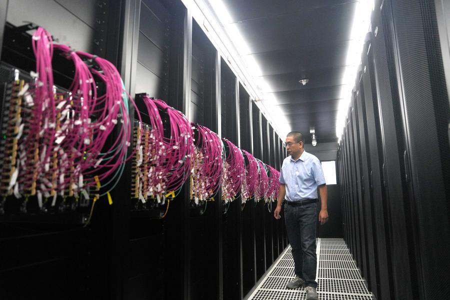 This photo provided by iSoftStone Information Technology (Group) Co., Ltd. shows a scene inside a token factory at the Beijing Economic-Technological Development Area in Beijing, capital of China, September 21, 2026. /Xinhua