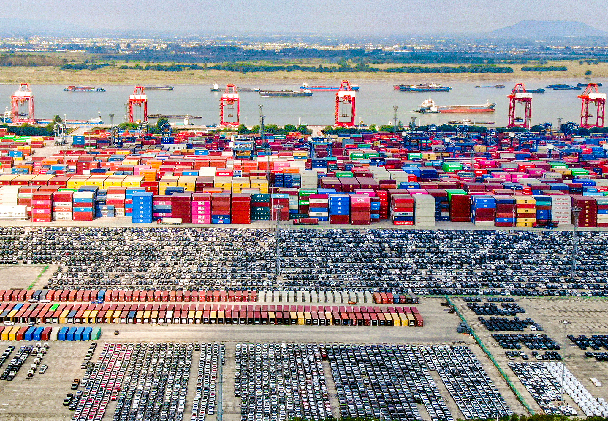 New energy vehicles are loaded onto ships for export to Europe at Nanjing Port in Nanjing, Jiangsu Province, China, October 10, 2026. /VCG