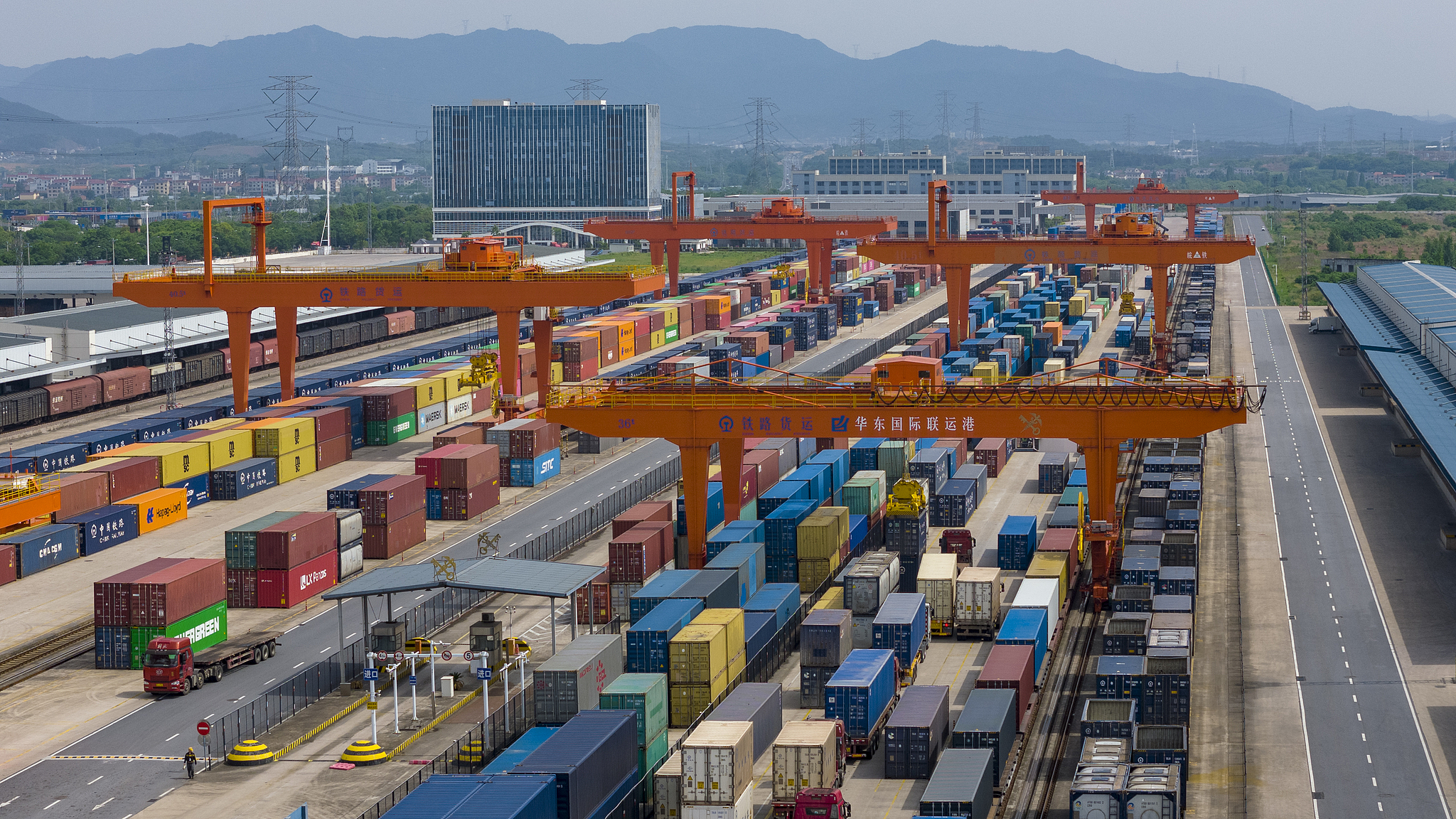 Containers are loaded onto a China-Europe freight train at the East China International Intermodal Port in Jinhua, Zhejiang Province, China, May 3, 2025. /VCG