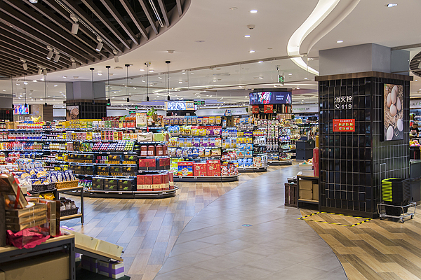 Consumer goods are displayed on shelves at a supermarket in China. /VCG